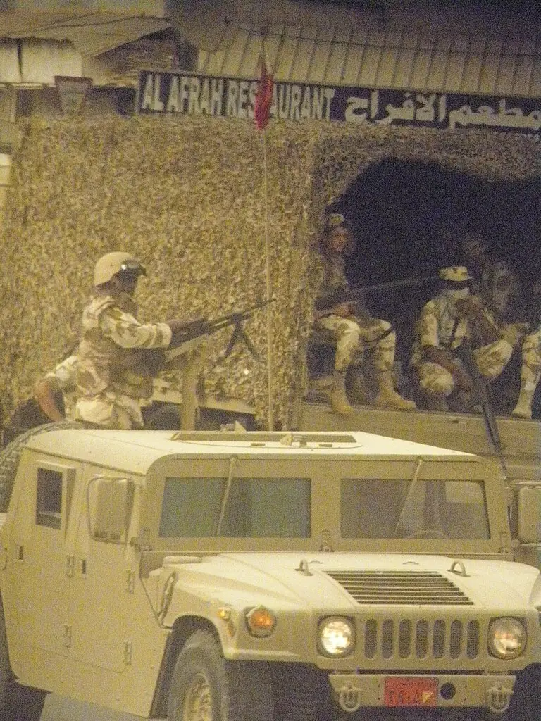 The Army infront of Al Afrah Restaurant, armed in heavy weaponry.