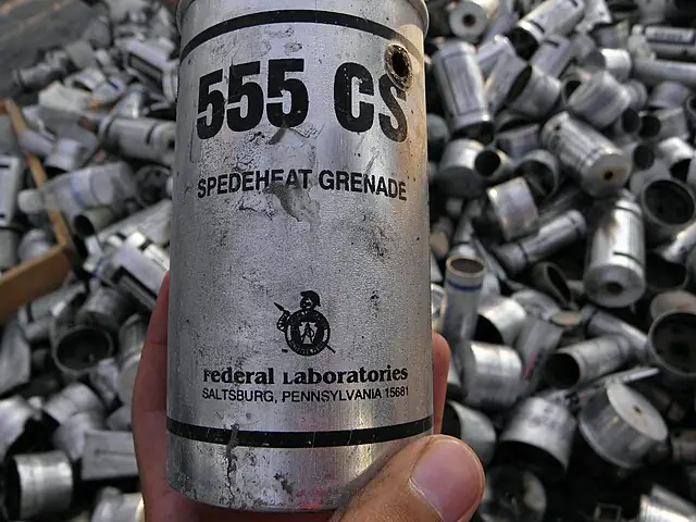 Gas Grenade canister, entitled '555 CS Spedeheat Grenade'.