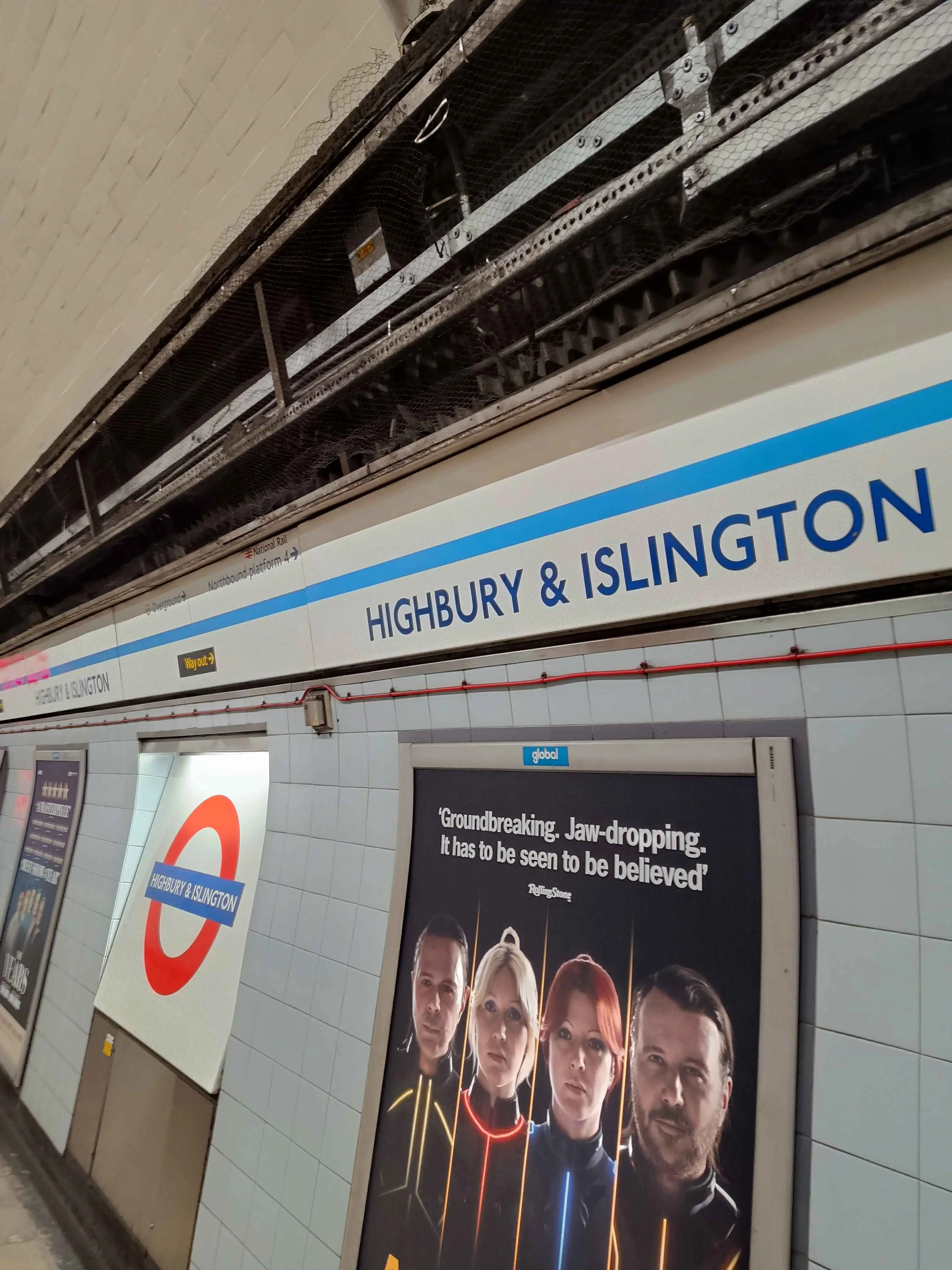 A side by side of the Victoria line and Great Northern platforms at Highbury and Islington station, with different fonts and visual identities.