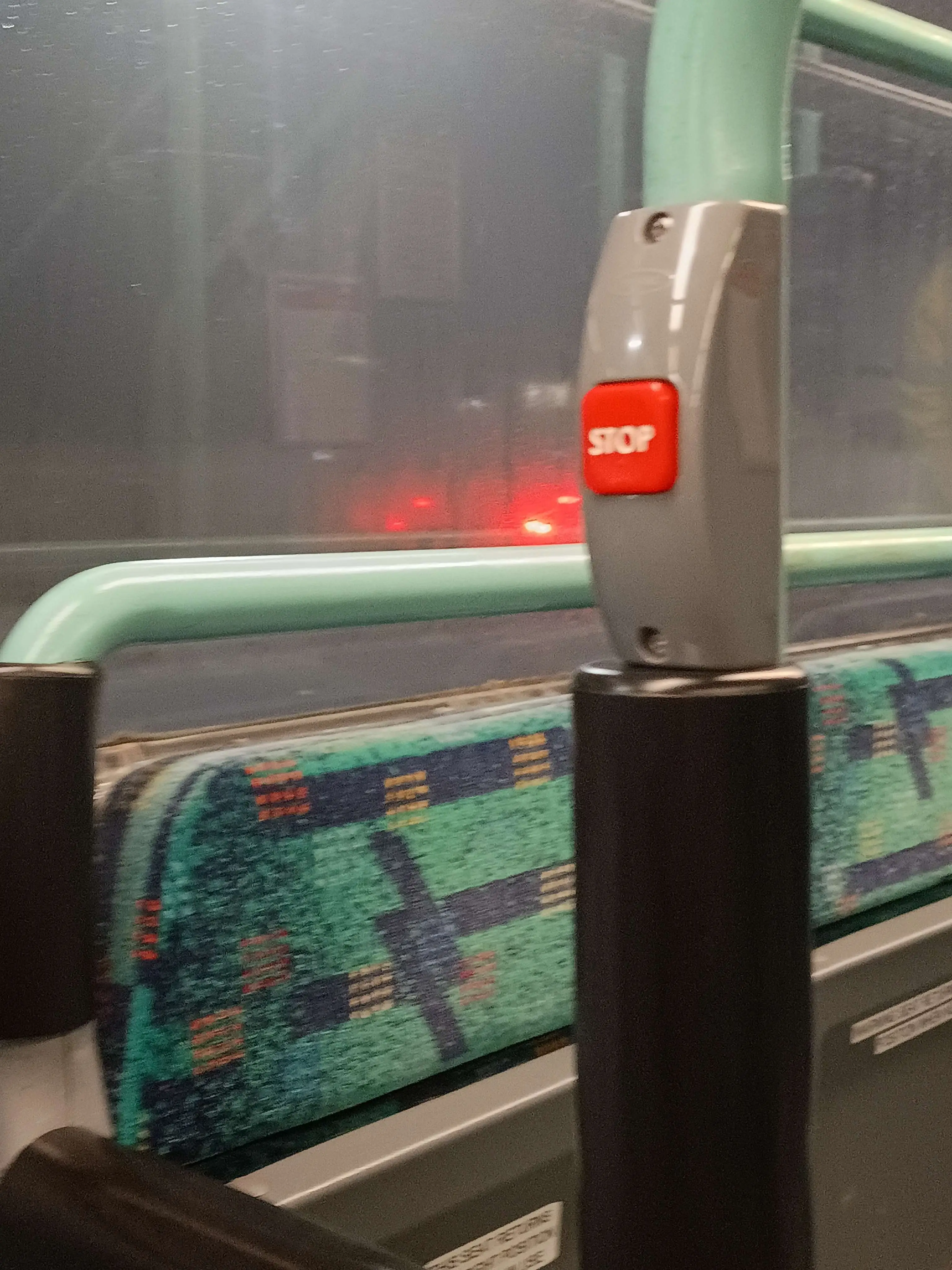 Stop button inside of a bus.
