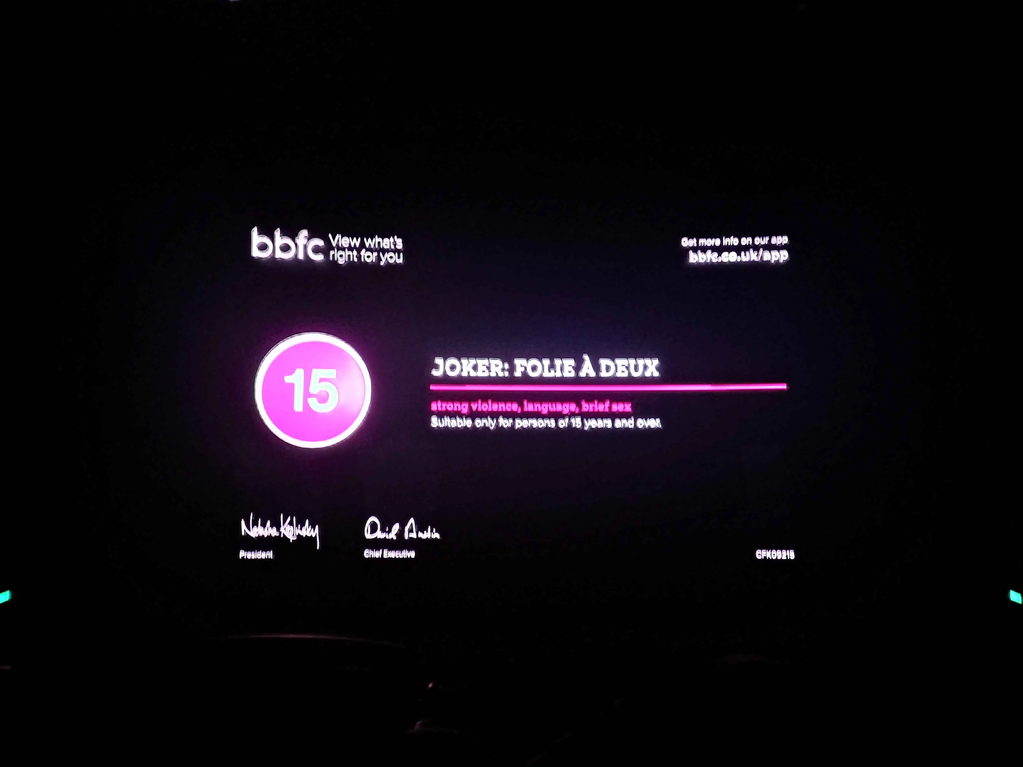 Waiting for the movie to start.